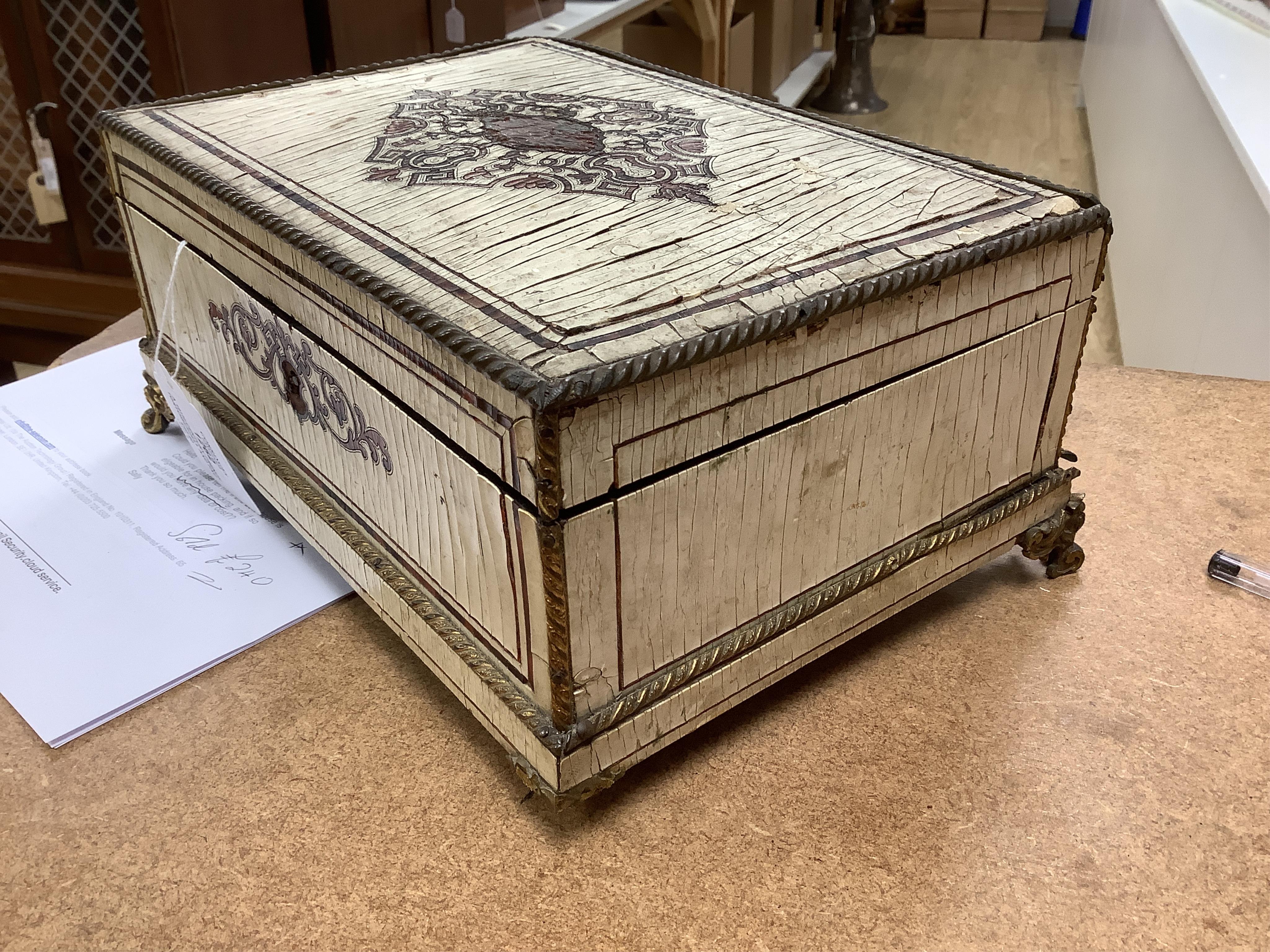 A 19th-century French tortoiseshell and faux lacquer work box, 24.5cm wide x 11.5cm high. Condition - poor to fair